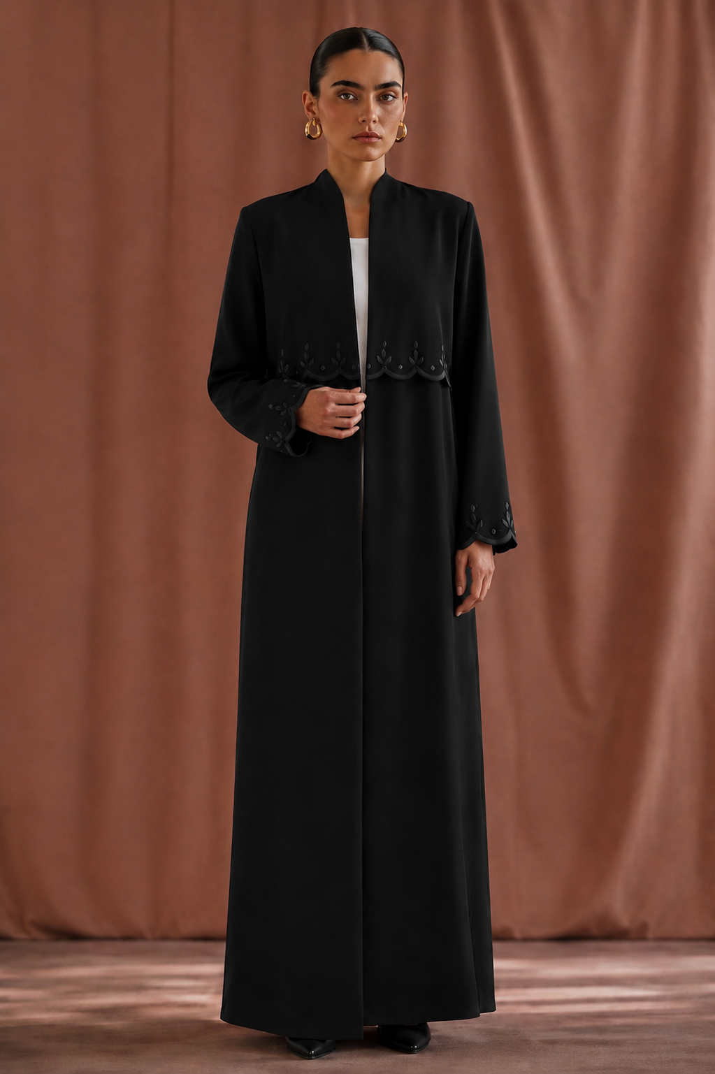 Black abaya with a simple black design
